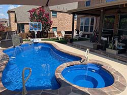Aquamarine contractor swimming pool Timberwood Park, Texas. Prefab inground fiberglass pools San Antonio with cost prices and design build install companies.